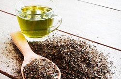 Чашка зеленого чая, сухой чай Чашка зеленого чая, сухой чай